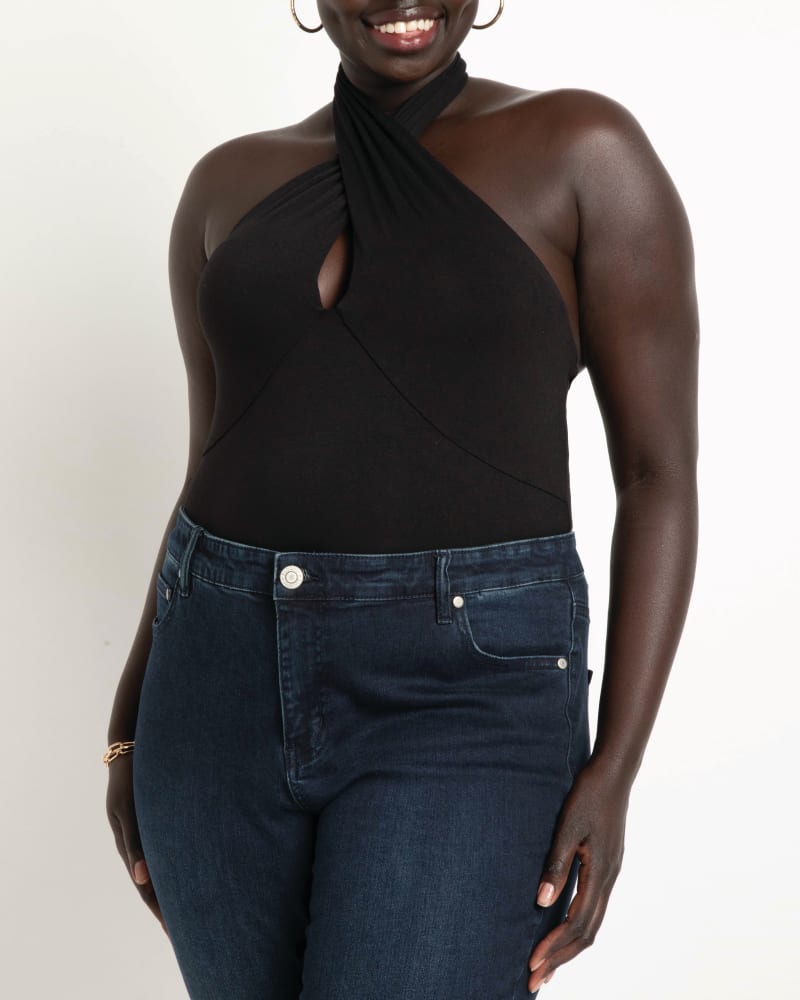 Front of a model wearing a size 14|16 Maryam Crossover Halter Bodysuit in Totally Black by ELOQUII. | dia_product_style_image_id:195659